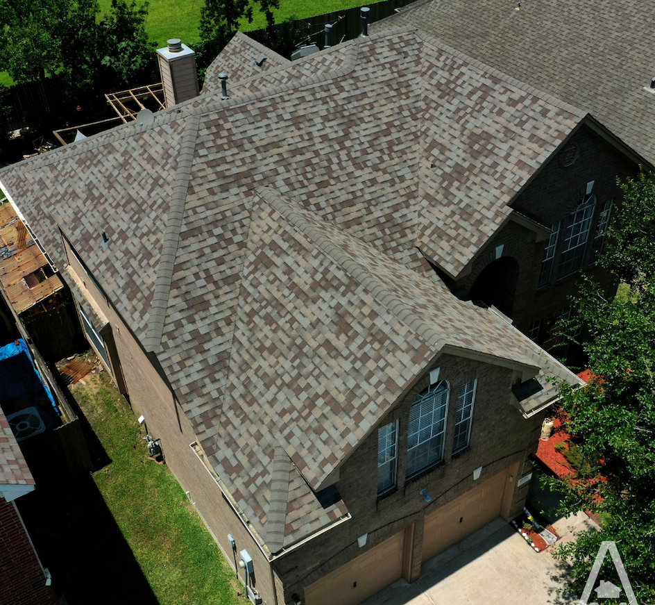 brown and gray shingle roof in houston