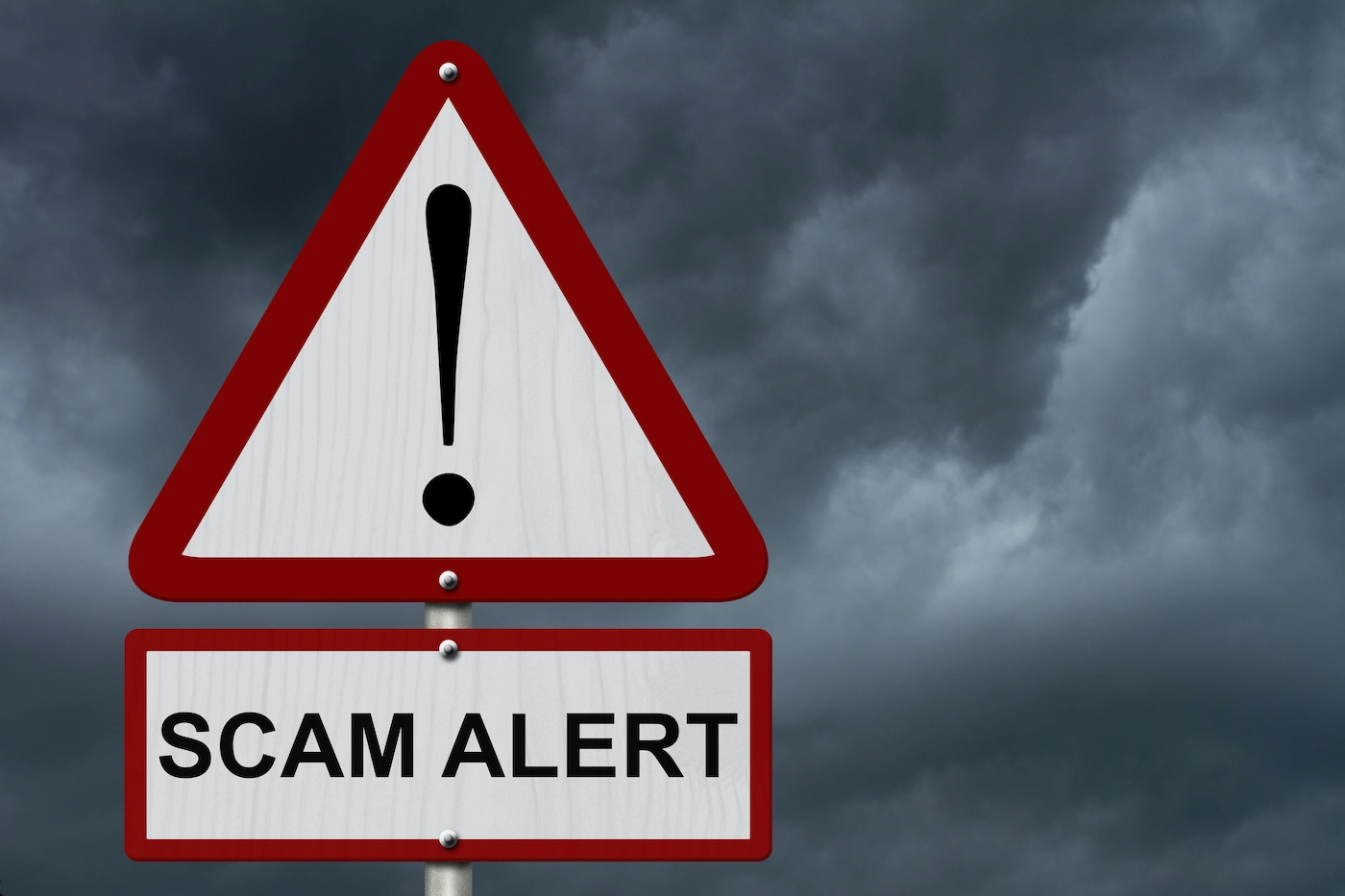 A triangular warning sign with an exclamation mark and a rectangular sign below it reading "SCAM ALERT HOUSTON ROOFING" against a backdrop of dark, stormy clouds.