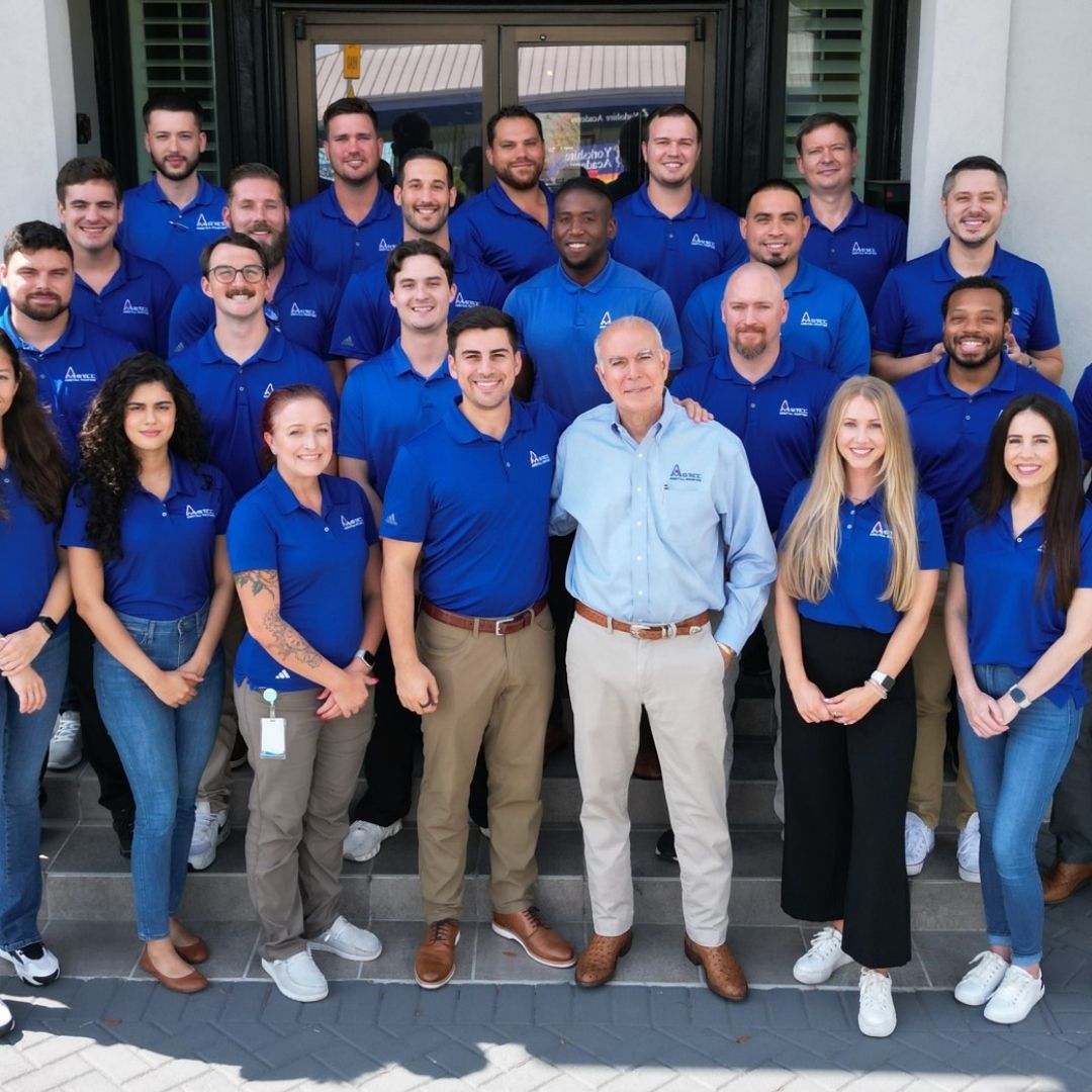 Team photo of Amstill Roofing: The best roofers in Houston, showcasing a cohesive team of experts working together to maintain their reputation as the #1 roofing contractor in Houston.