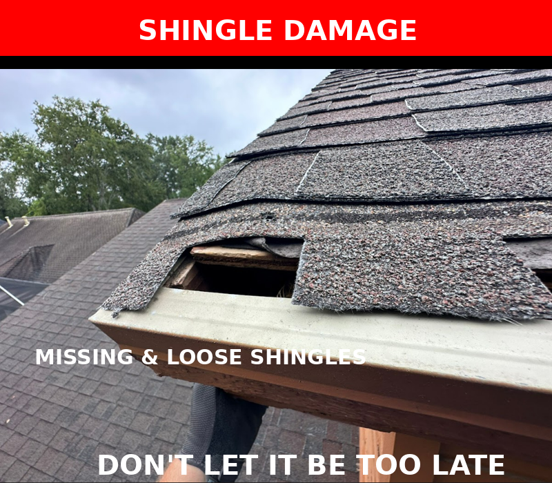 Close-up image of a roof edge with lifted and missing asphalt shingles, revealing the wood decking underneath.